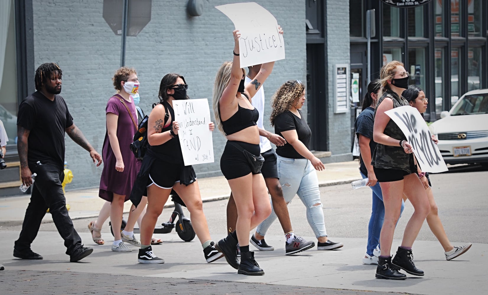 PHOTOS: Protestors march through the Oregon District Thursday