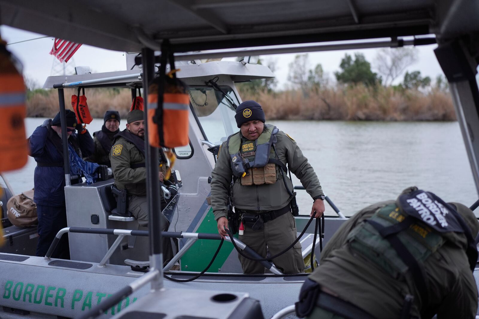 Border patrol agents prepare to patrol along the Rio Grande at the U.S.-Texas border, Thursday, Feb. 13, 2025, in McAllen, Texas. (AP Photo/Eric Gay)