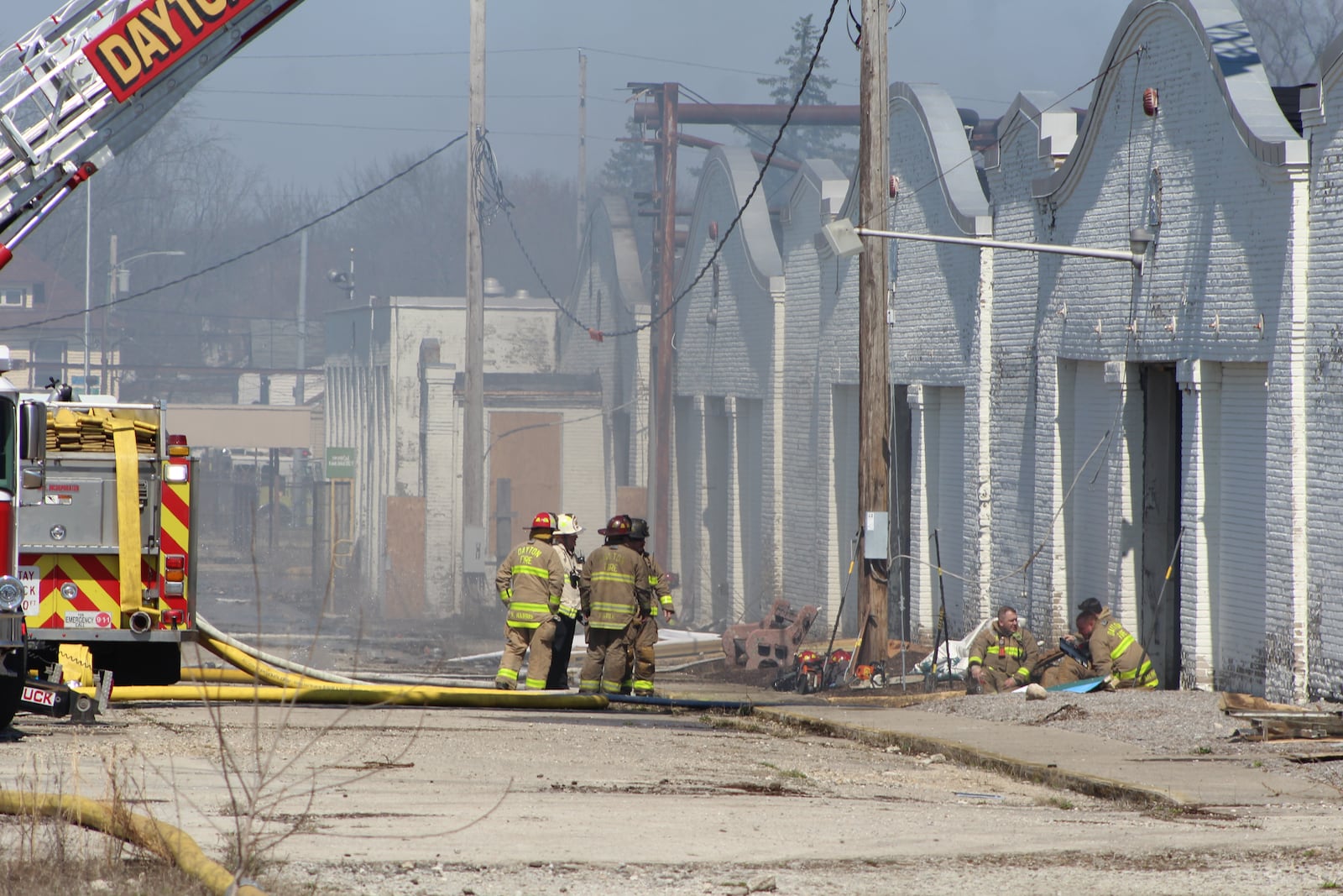 Dayton firefighters at the scene of a fire at the historic Wright brothers factory site in West Dayton on Sunday, March 26, 2023. CORNELIUS FROLIK / STAFF