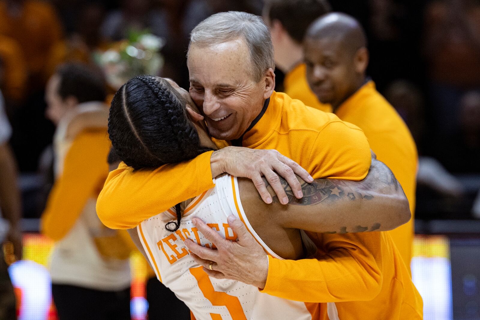 Tennessee head coach Rick Barnes laughs as Zakai Zeigler lifts him off the floor after an NCAA college basketball game against South Carolina, Saturday, March 8, 2025, in Knoxville, Tenn. (AP Photo/Wade Payne)