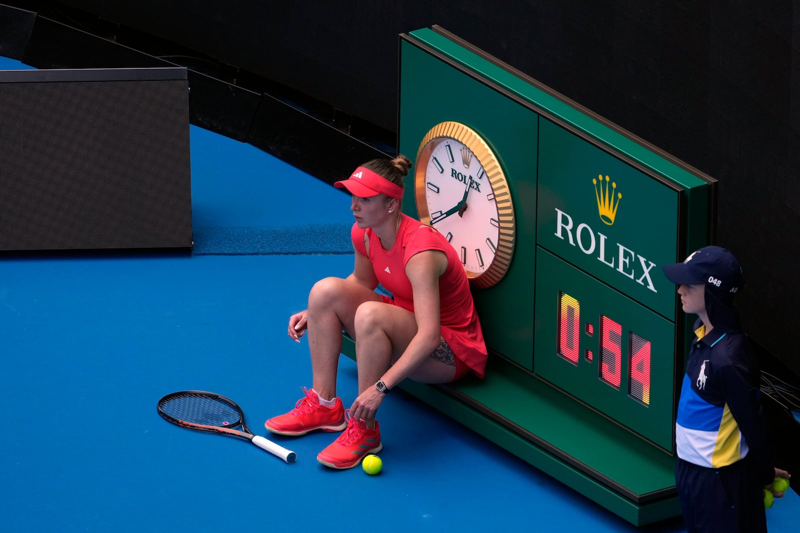 Elina Svitolina of Ukraine sits during a break in her fourth round match against Veronika Kudermetova of Russia at the Australian Open tennis championship in Melbourne, Australia, Monday, Jan. 20, 2025. (AP Photo/Asanka Brendon Ratnayake)