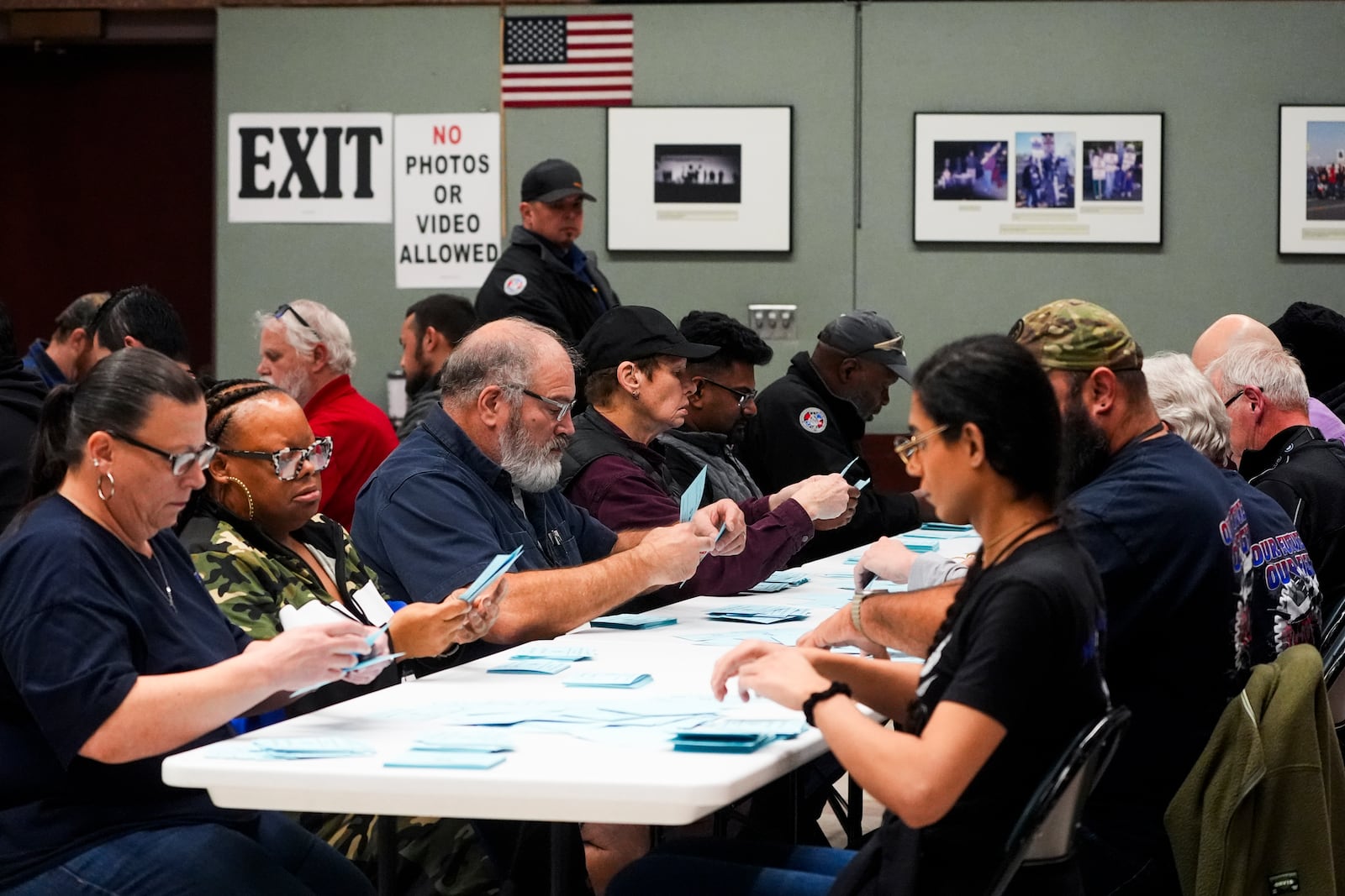 Volunteers tally votes on a new contract offer from Boeing, Monday, Nov. 4, 2024, at the IAM District 751 Union Hall in Seattle. (AP Photo/Lindsey Wasson)