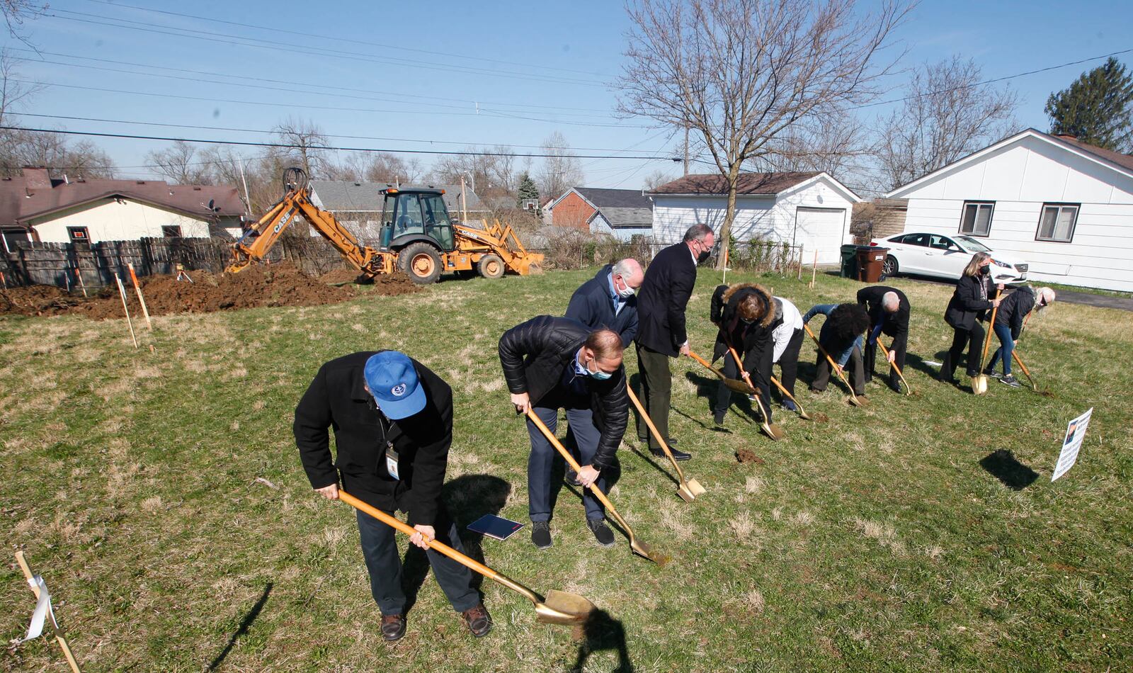 Area officials broke ground Monday on Saylor Street in Harrison Twp. for the first house to be built as part of the Pathway Project, an initiative to provide tornado survivors previously renting with the ability to become homeowners. CHRIS STEWART / STAFF