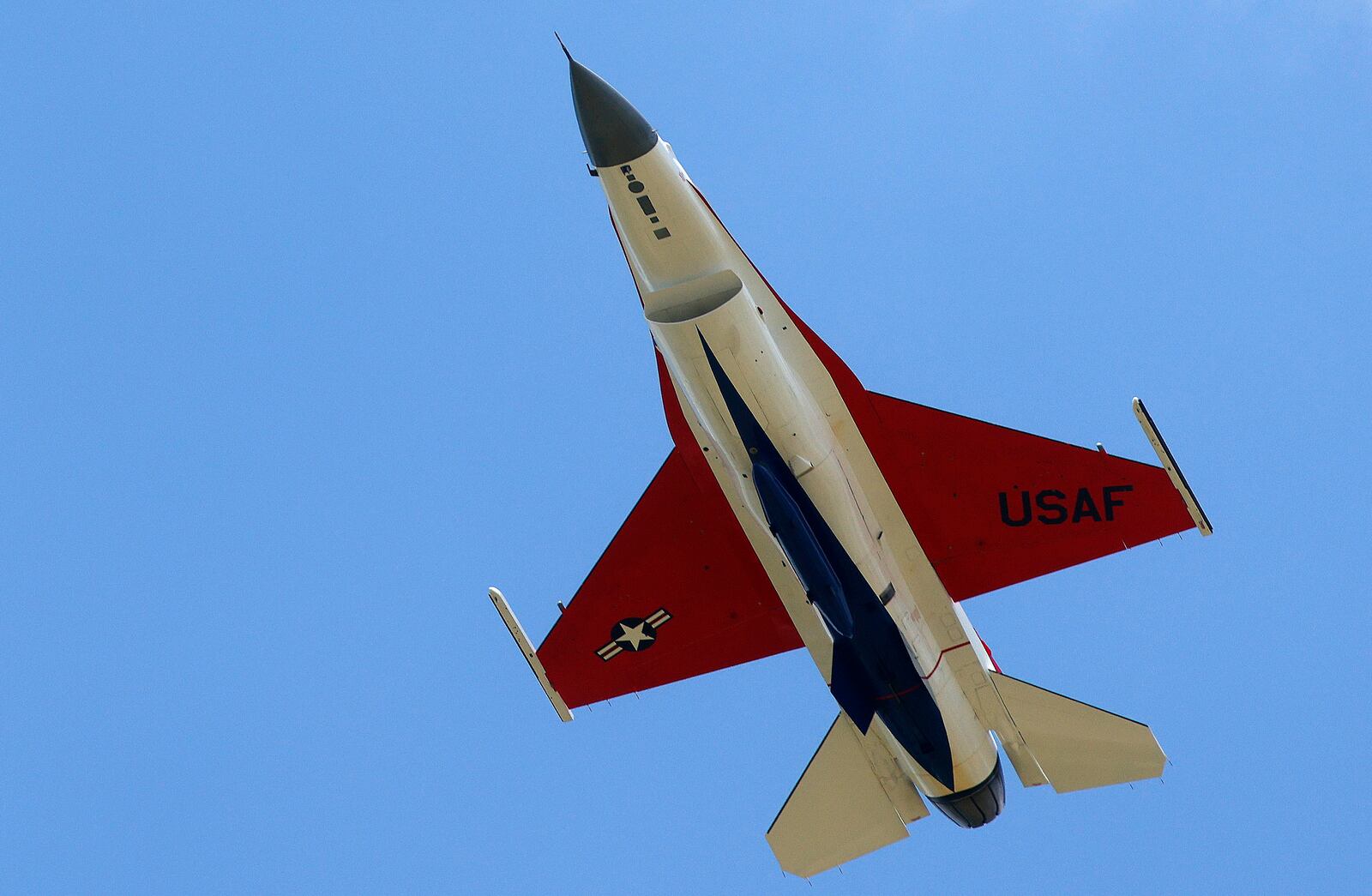 The F-16 Viper Demonstration Team flies over the National Museum of the U.S. Air Force Monday, June 24, 2024 to celebrate the 50th anniversary of the F-16 Fighting Falcon. MARSHALL GORBY\STAFF