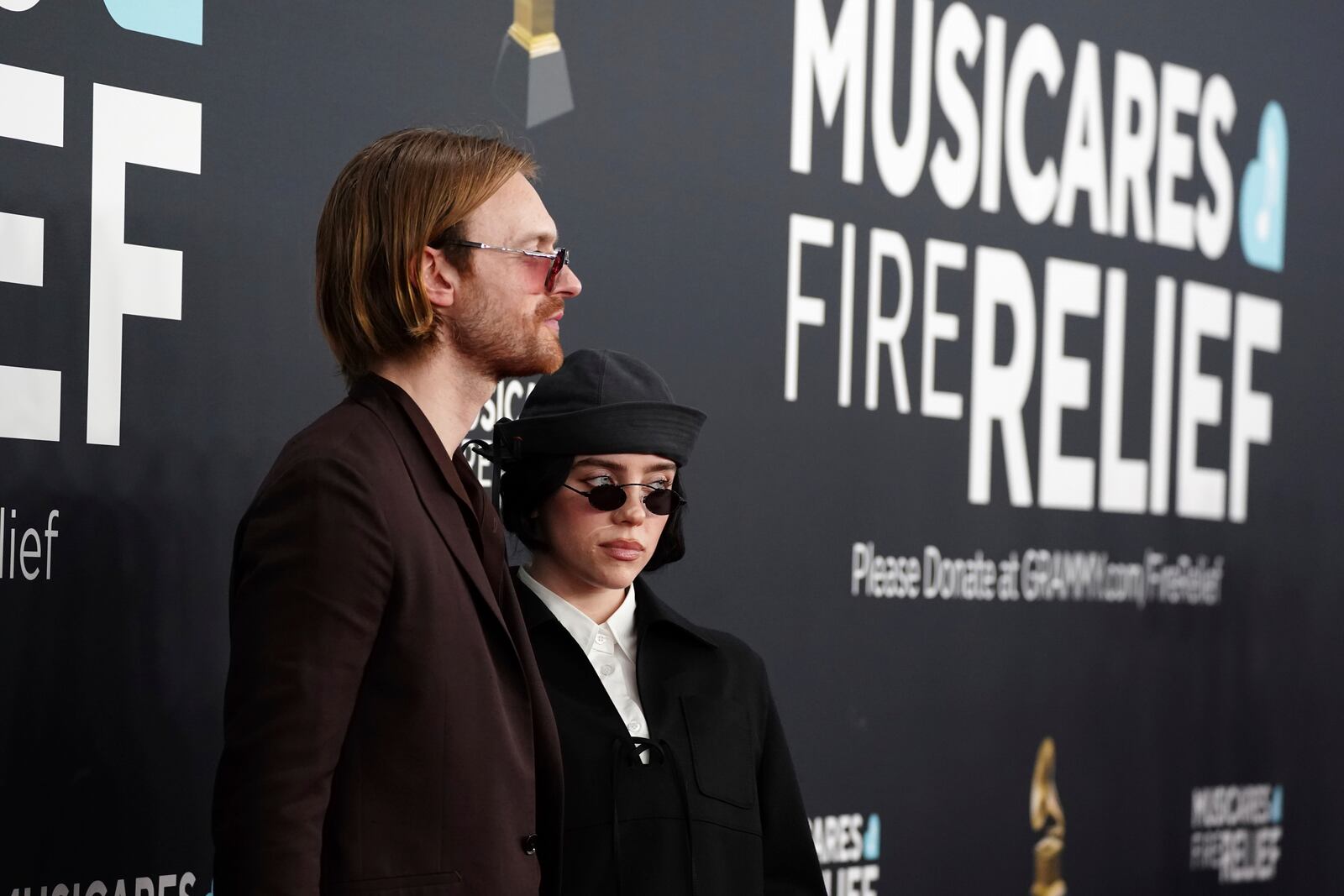 Finneas, left, and Billie Eilish arrive at the 67th annual Grammy Awards on Sunday, Feb. 2, 2025, in Los Angeles. (Photo by Jordan Strauss/Invision/AP)