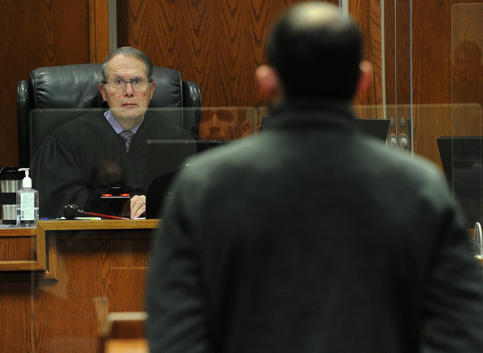 Judge Dennis Adkins talks with a veteran during Montgomery County Veterans Court Wednesday, March 8, 2023. MARSHALL GORBY\STAFF