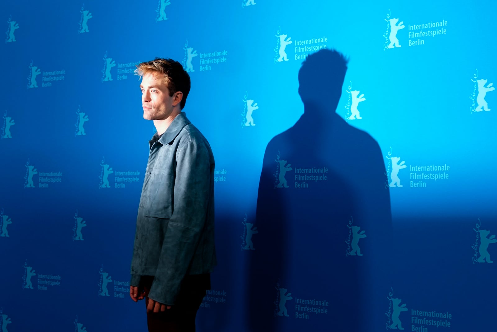 Robert Pattinson poses for photographer at the photo call for the film 'Mickey 17' at the International Film Festival, Berlinale, in Berlin, Saturday, Feb. 15, 2025. (AP Photo/Markus Schreiber)