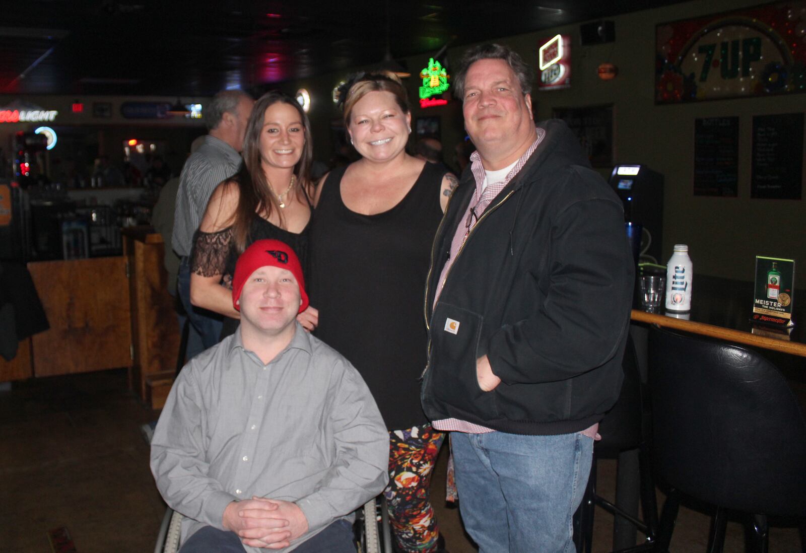 MacKenzie Manley opened Mack's Tavern in 2013.  The pub is  described as “a laid back neighborhood bar with amazingly good food.”  It won first place in five Best of Dayton categories including, Best dive bar, best bartender and best bathroom. Manley (center) is pictured with bartender  Andrea Russ and bar regulars Paul Erickson and Johnny Sullivan (front).