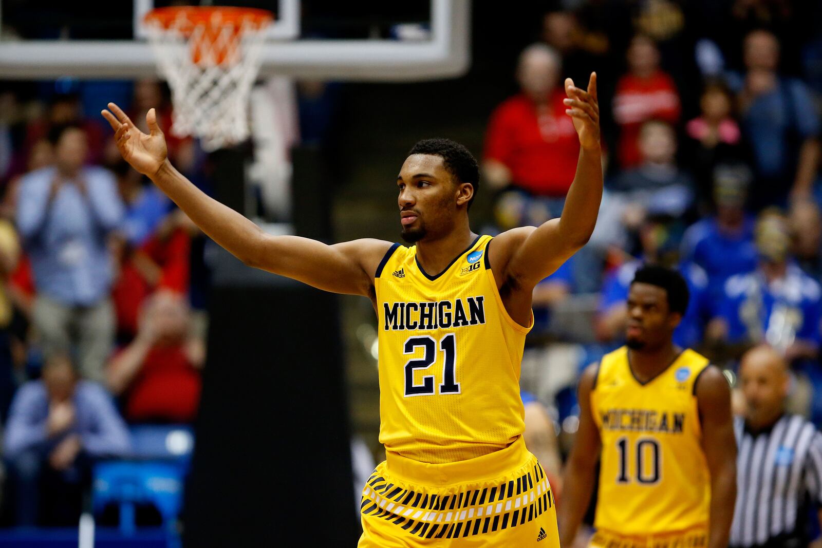 DAYTON, OH - MARCH 16: Zak Irvin #21 of the Michigan Wolverines reacts in the second half against the Tulsa Golden Hurricane during the first round of the 2016 NCAA Men’s Basketball Tournament at UD Arena on March 16, 2016 in Dayton, Ohio. (Photo by Gregory Shamus/Getty Images)