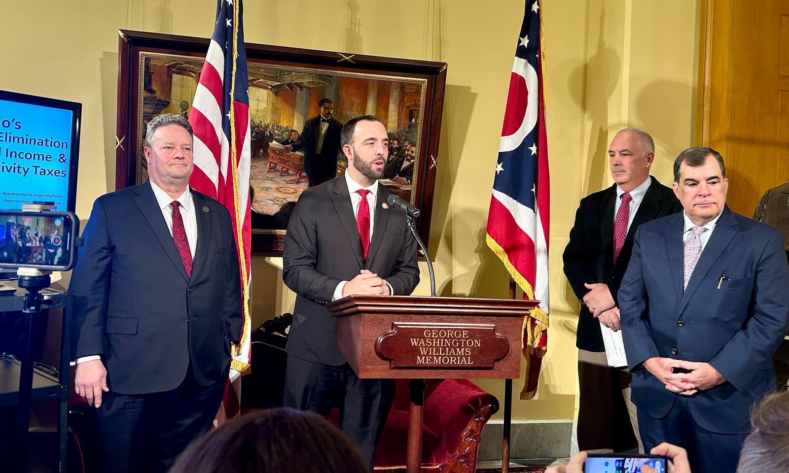 Rep. Adam Mathews, R-Lebanon, outlines a longterm plan to eliminate Ohio's personal income tax. He's joined by Miami Valley's Rep. Brian Lampton, R-Beavercreek; Sen. Steve Huffman, R-Tipp City; and Sen. George Lang, R-West Chester. January 23, 2024.