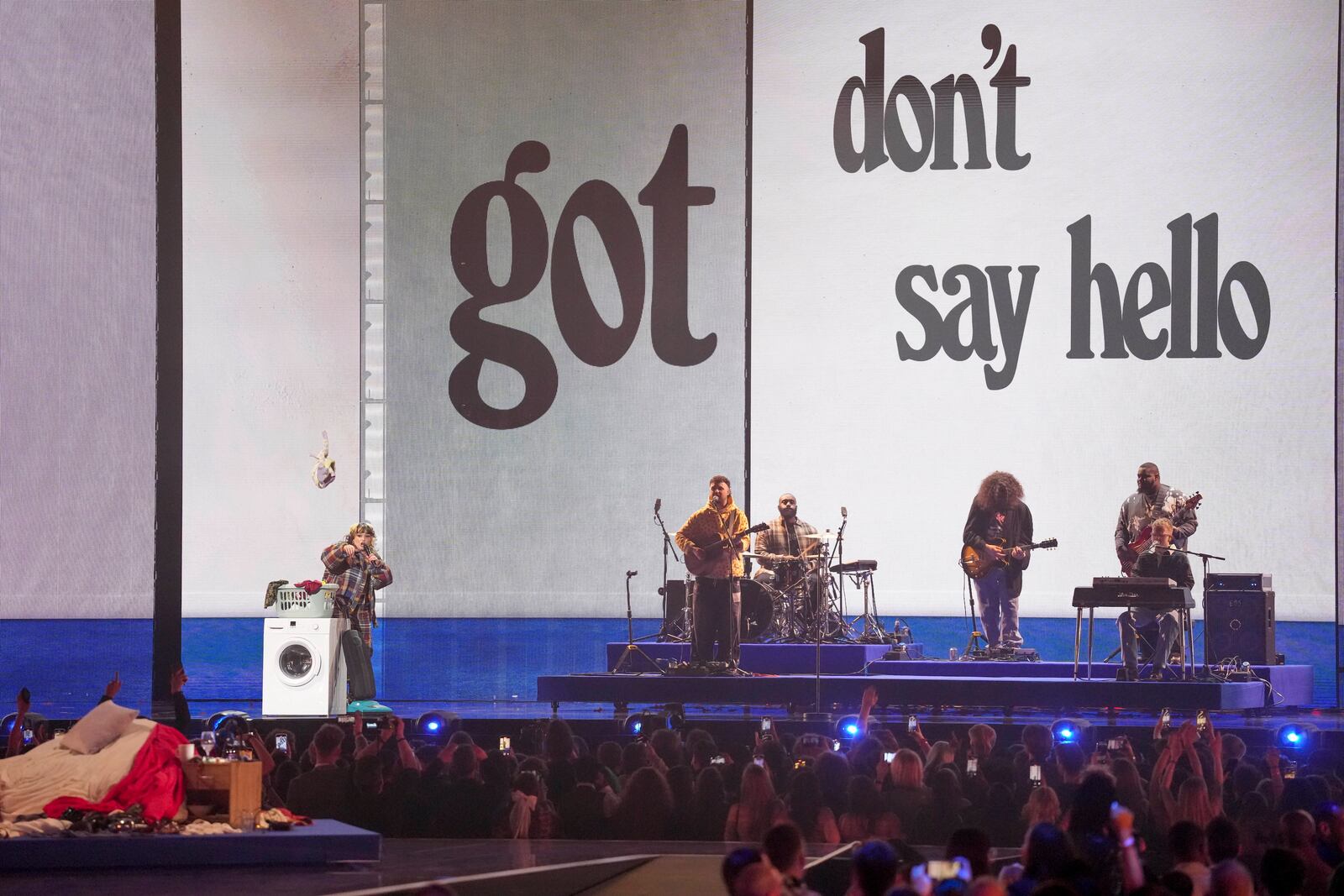 Lola Young performs during the Brit Awards 2025 in London, Saturday, March.1, 2025. (Photo by Scott A Garfitt/Invision/AP)