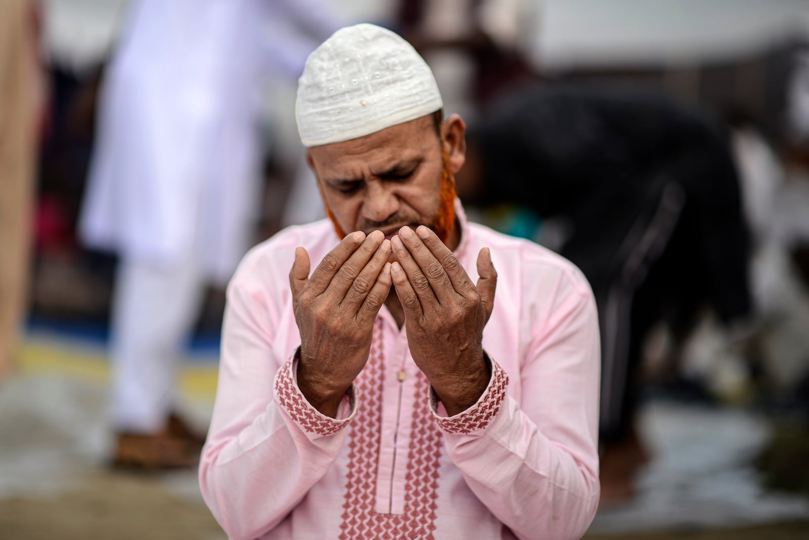 A Muslim devotee prays during the first phase of the three-day Biswa Ijtema, or the World Congregation of Muslims, at the banks of the Turag river in Tongi, near Dhaka, Bangladesh, Friday, Jan. 31, 2025. (AP Photo/Mahmud Hossain Opu)