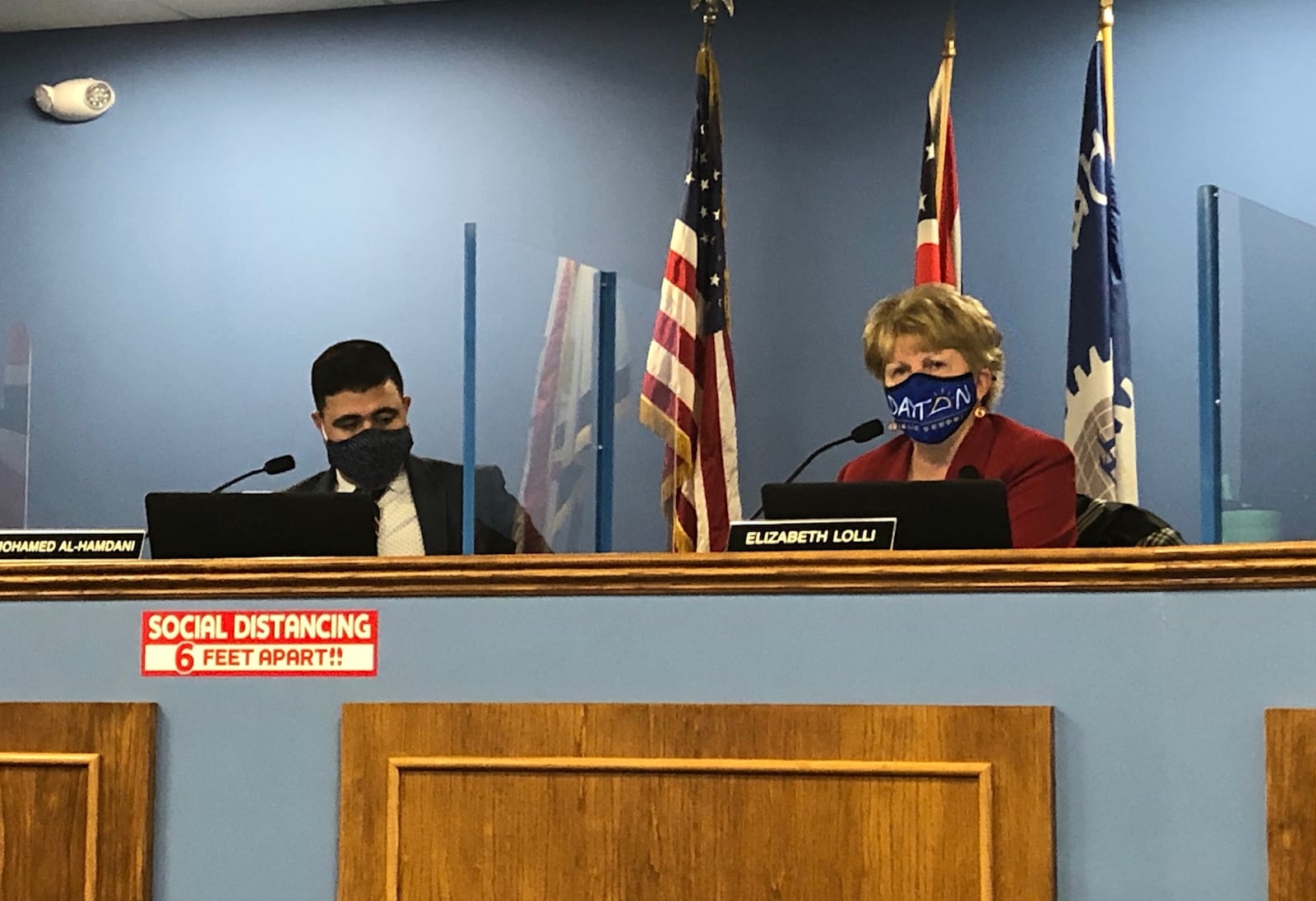 Dayton Public Schools Board President Mohamed Al-Hamdani listens as Superintendent Elizabeth Lolli speaks at the Oct. 20 school board meeting. JEREMY P. KELLEY / STAFF