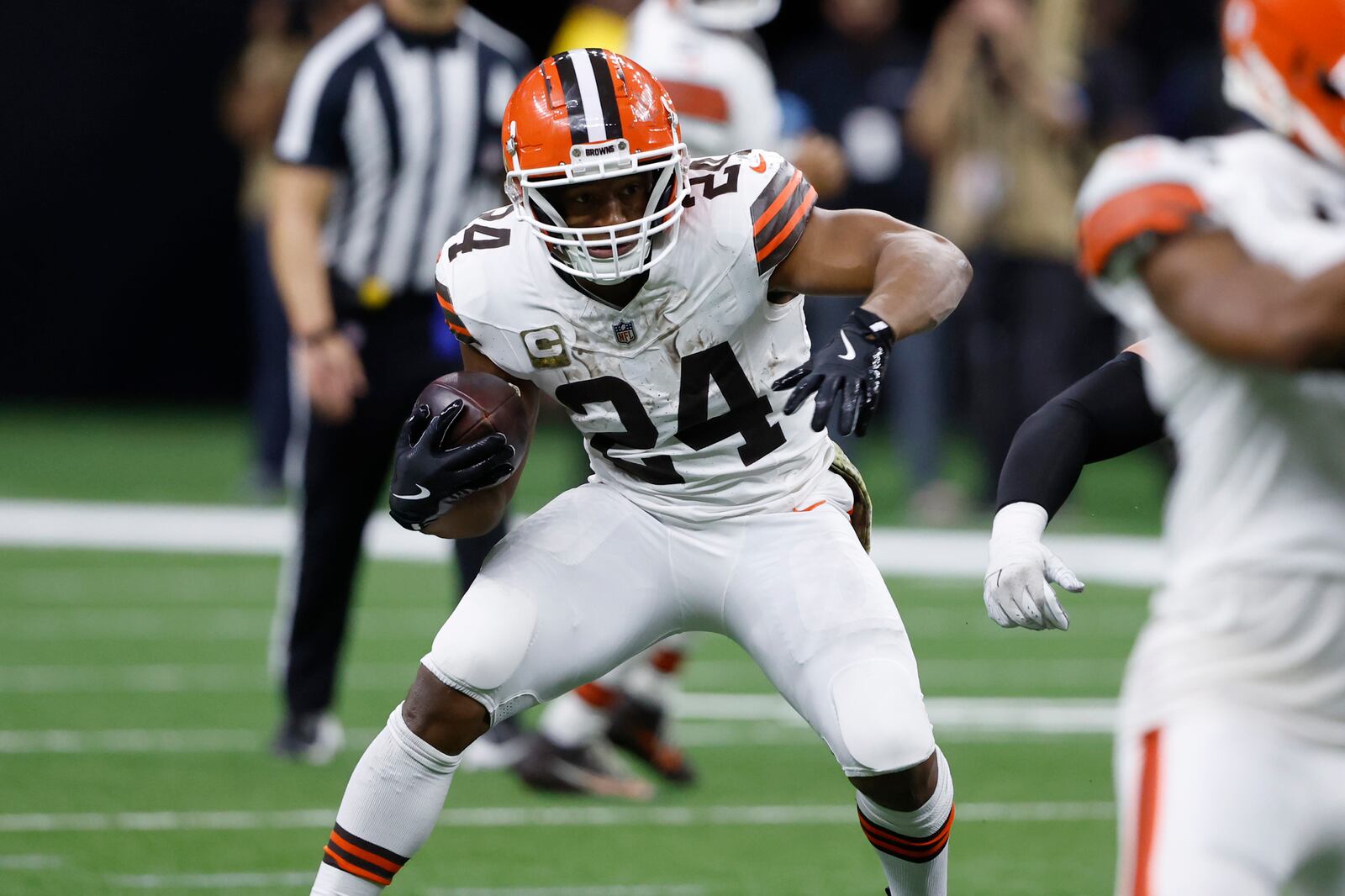 Cleveland Browns running back Nick Chubb (24) carries in the second half of an NFL football game against the New Orleans Saints in New Orleans, Sunday, Nov. 17, 2024. (AP Photo/Butch Dill)