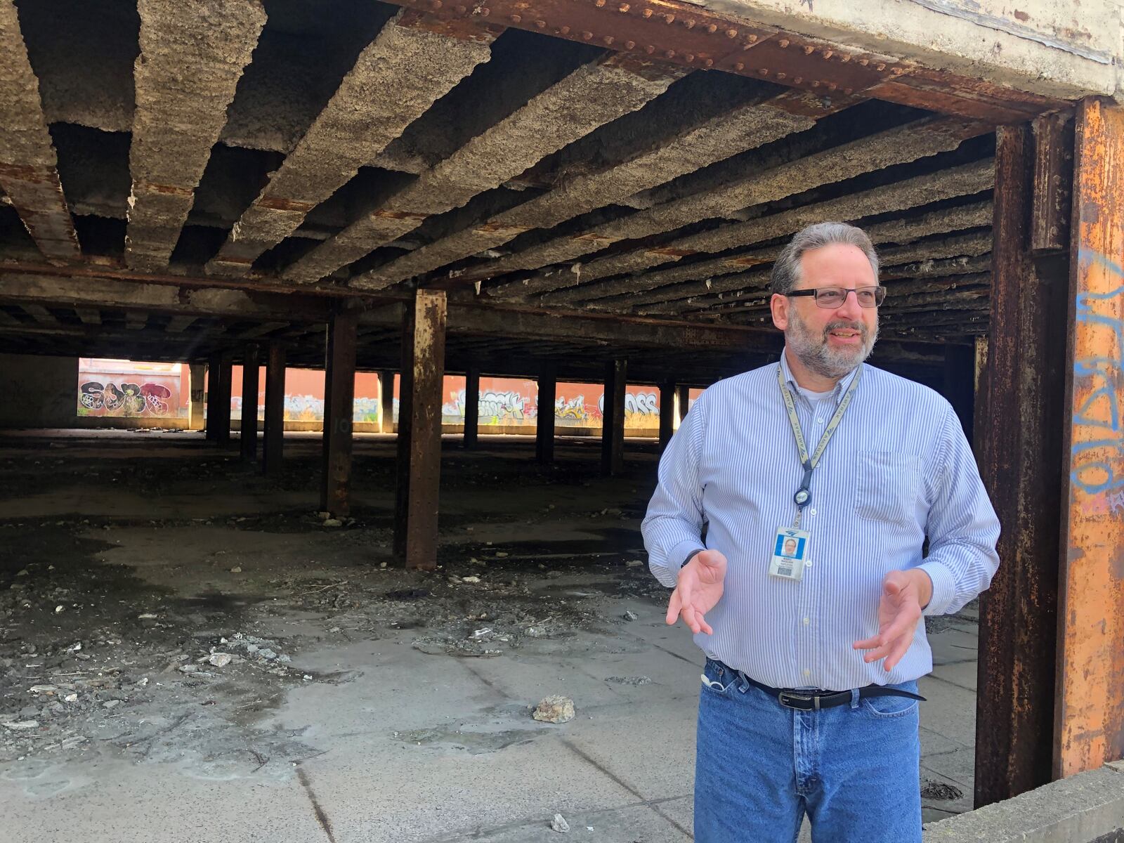 Marc Magliari, Amtrak spokesman, stands by the former Dayton Union Station on West Sixth Street. CORNELIUS FROLIK / STAFF