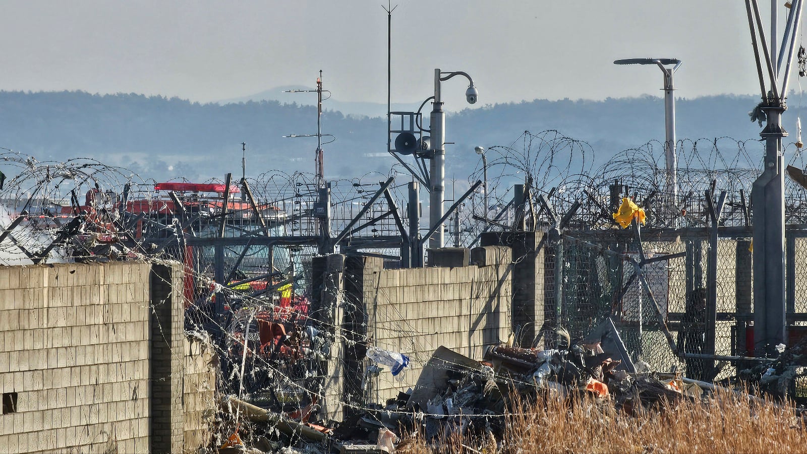 A rescue team works to extinguish a fire at the Muan International Airport in Muan, South Korea, Sunday, Dec. 29, 2024. (Maeng Dae-hwan/Newsis via AP)