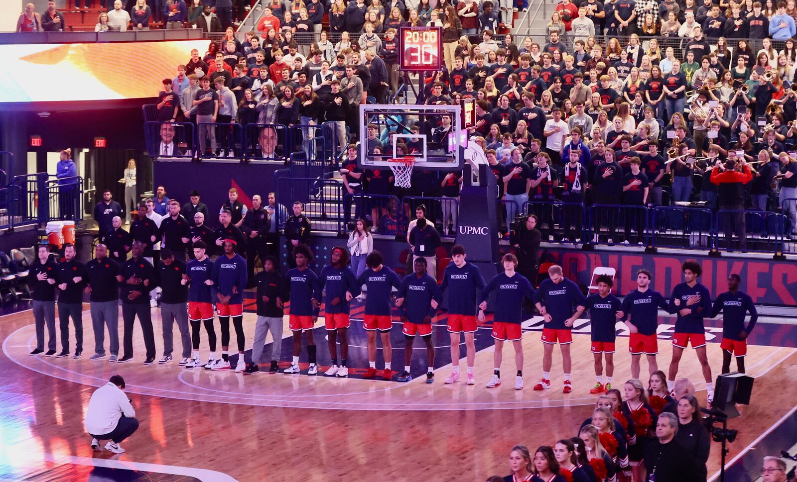 Dayton stands for the national anthem before a game against Duquesne on Friday, Jan. 12, 2024, at the UPMC Cooper Fieldhouse in Pittsburgh. David Jablonski/Staff