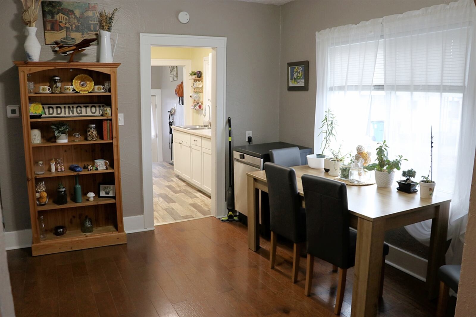 A picture window gives the dining room a more spacious feel.