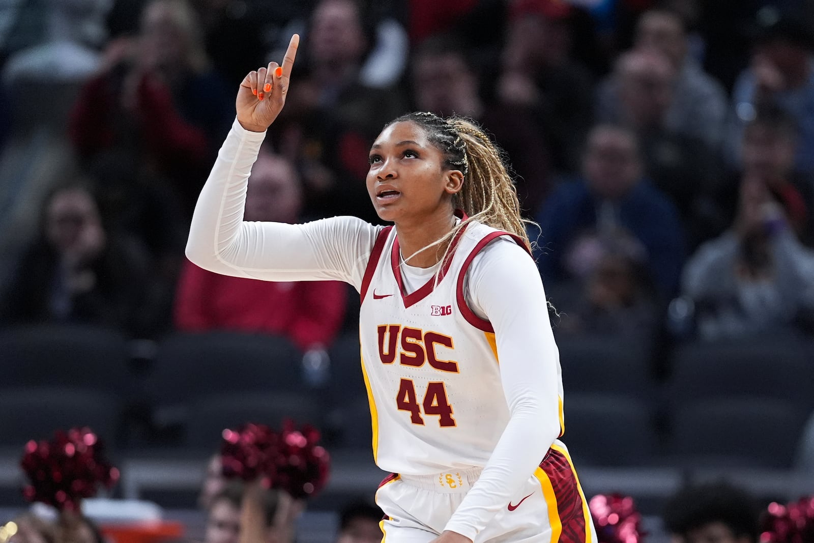 Southern California forward Kiki Iriafen (44) reacts to a play against UCLA during the second half of an NCAA college basketball game in the championship of the Big Ten Conference tournament in Indianapolis, Sunday, March 9, 2025. (AP Photo/Michael Conroy)