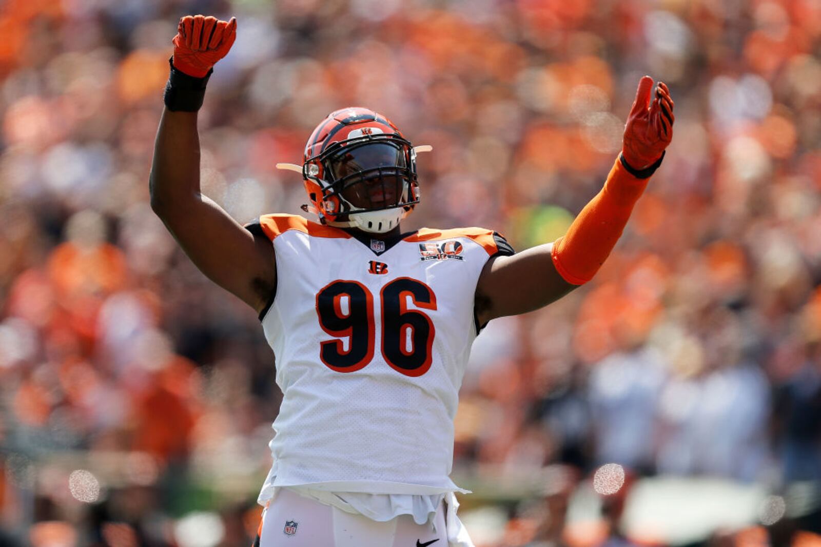 CINCINNATI, OH - SEPTEMBER 10: Carlos Dunlap #96 of the Cincinnati Bengals attempts to get the crowd to cheer during the first quarter of the game against the Baltimore Ravens at Paul Brown Stadium on September 10, 2017 in Cincinnati, Ohio. (Photo by Michael Reaves/Getty Images)