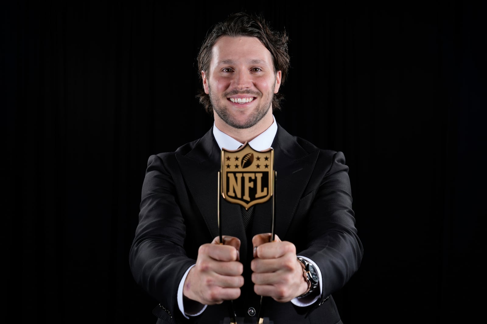 Buffalo Bills' Josh Allen, AP NFL Most Valuable Player, poses after winning the award at the NFL Honors award show ahead of the Super Bowl 59 football game, Thursday, Feb. 6, 2025, in New Orleans. (AP Photo/Matt York)