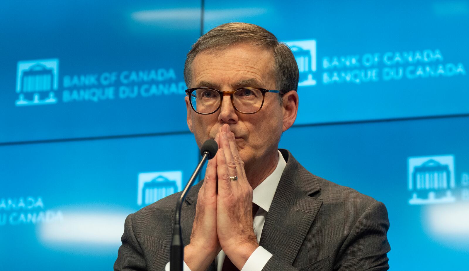 Bank of Canada Governor Tiff Macklem listens to an online question during a news conference, Wednesday, Dec. 11, 2024 in Ottawa, Ontario. (Adrian Wyld/The Canadian Press via AP)