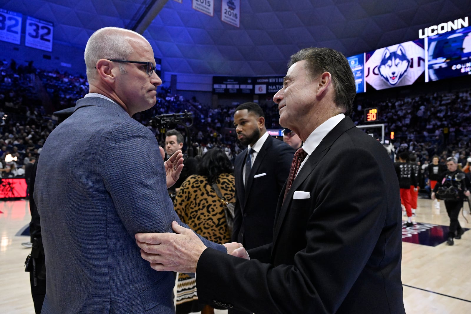 UConn head coach Dan Hurley, left, and St. John's head coach Rick Pitino, right, greet each other before an NCAA college basketball game, Friday, Feb. 7, 2025, in Storrs, Conn. (AP Photo/Jessica Hill)