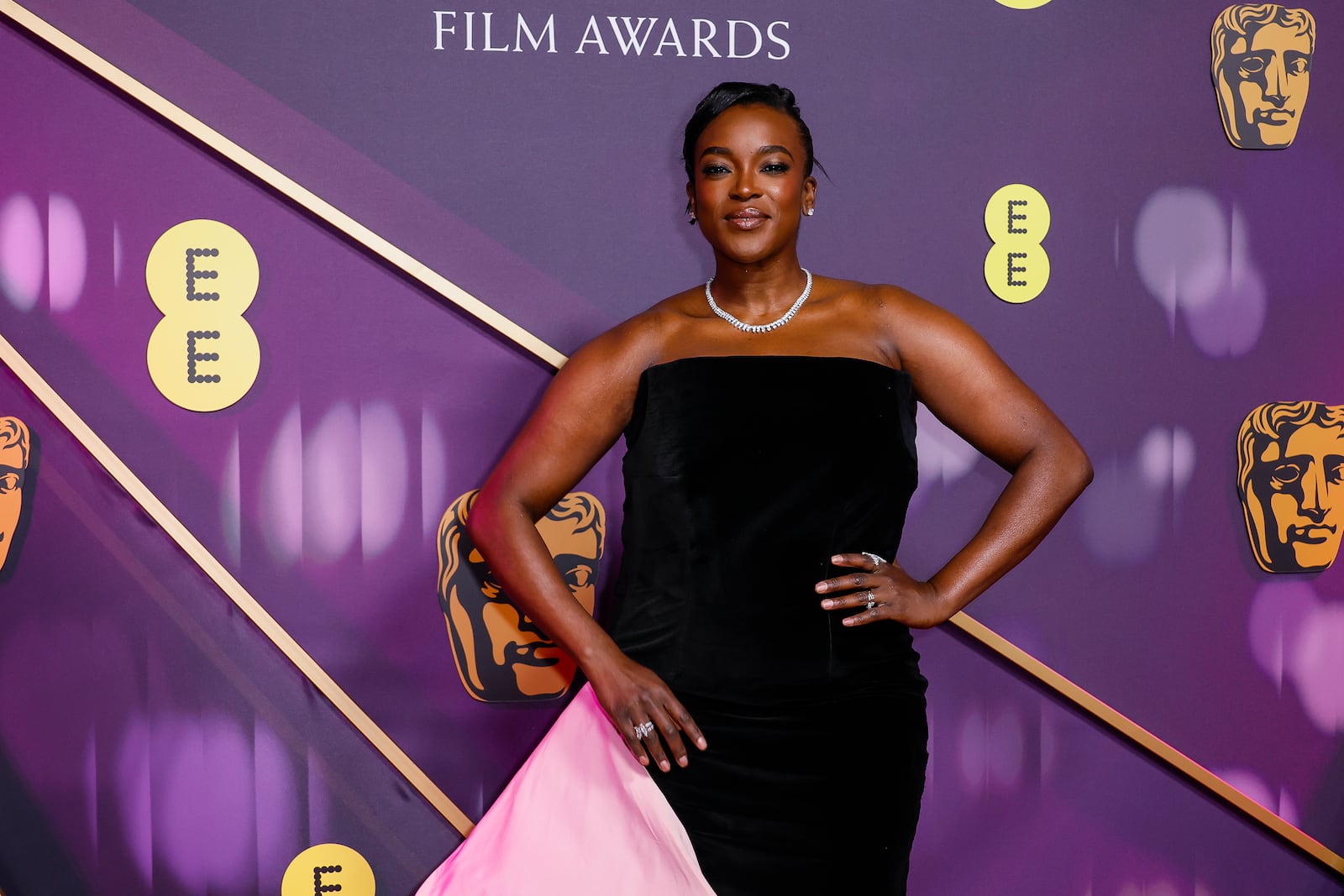 Wunmi Mosaku poses for photographers upon arrival at the 78th British Academy Film Awards, BAFTA's, in London, Sunday, Feb. 16, 2025. (Photo by Joel C Ryan/Invision/AP)