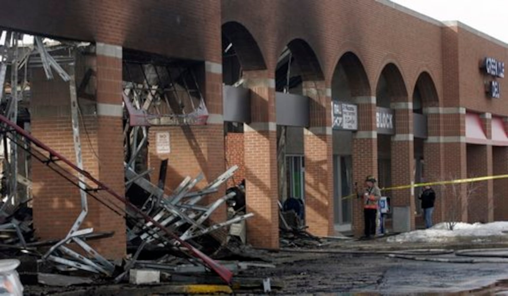 Page Manor shopping center damaged by fire