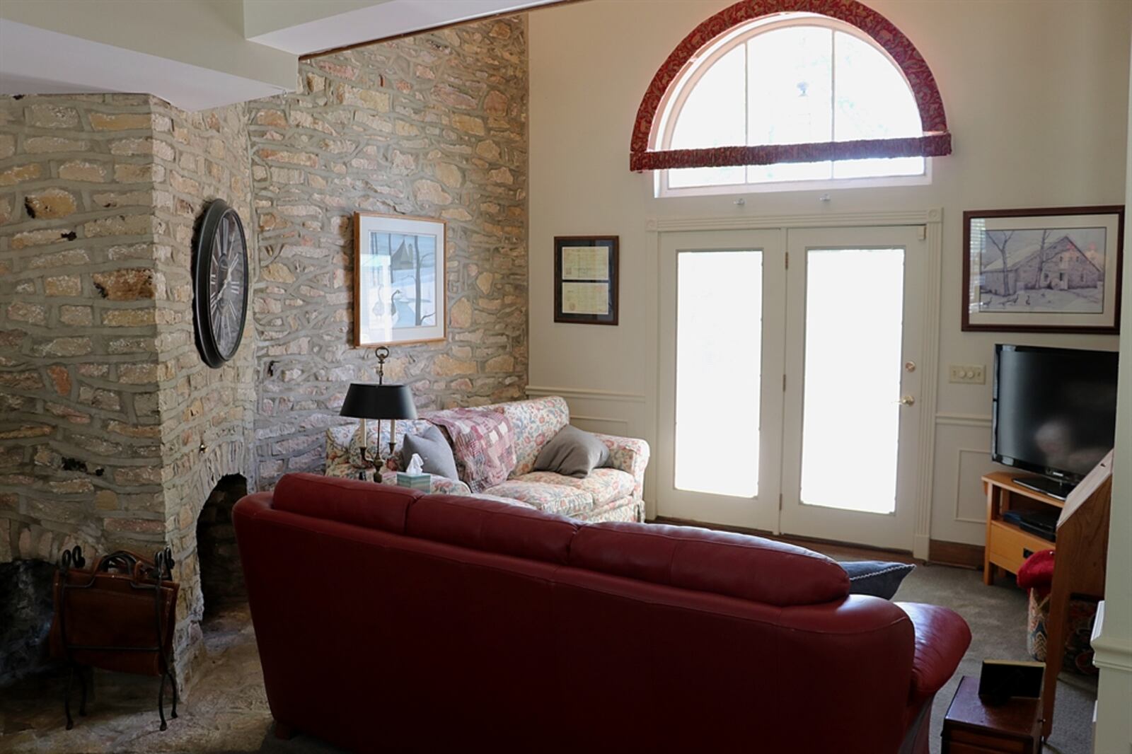 The original dated stone of 1816 accents the formal front entry, which opens through the 20-inch thick stone walls. Inside, the space is open to include a formal dining area and flexible living room. CONTRIBUTED PHOTO BY KATHY TYLER