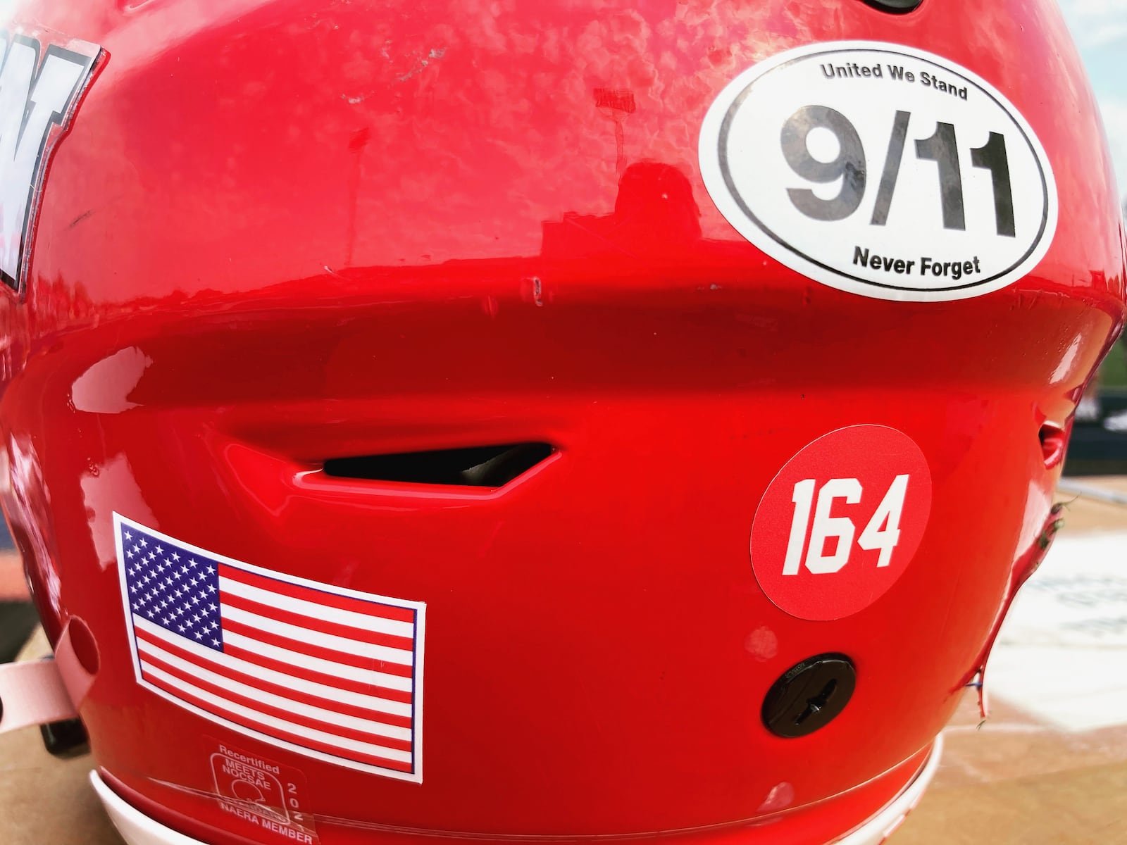 Dayton football players wore 9/11 patches on their helmets on Saturday, Sept. 11, 2021, during a game against Eastern Illinois at Welcome Stadium. David Jablonski/Staff