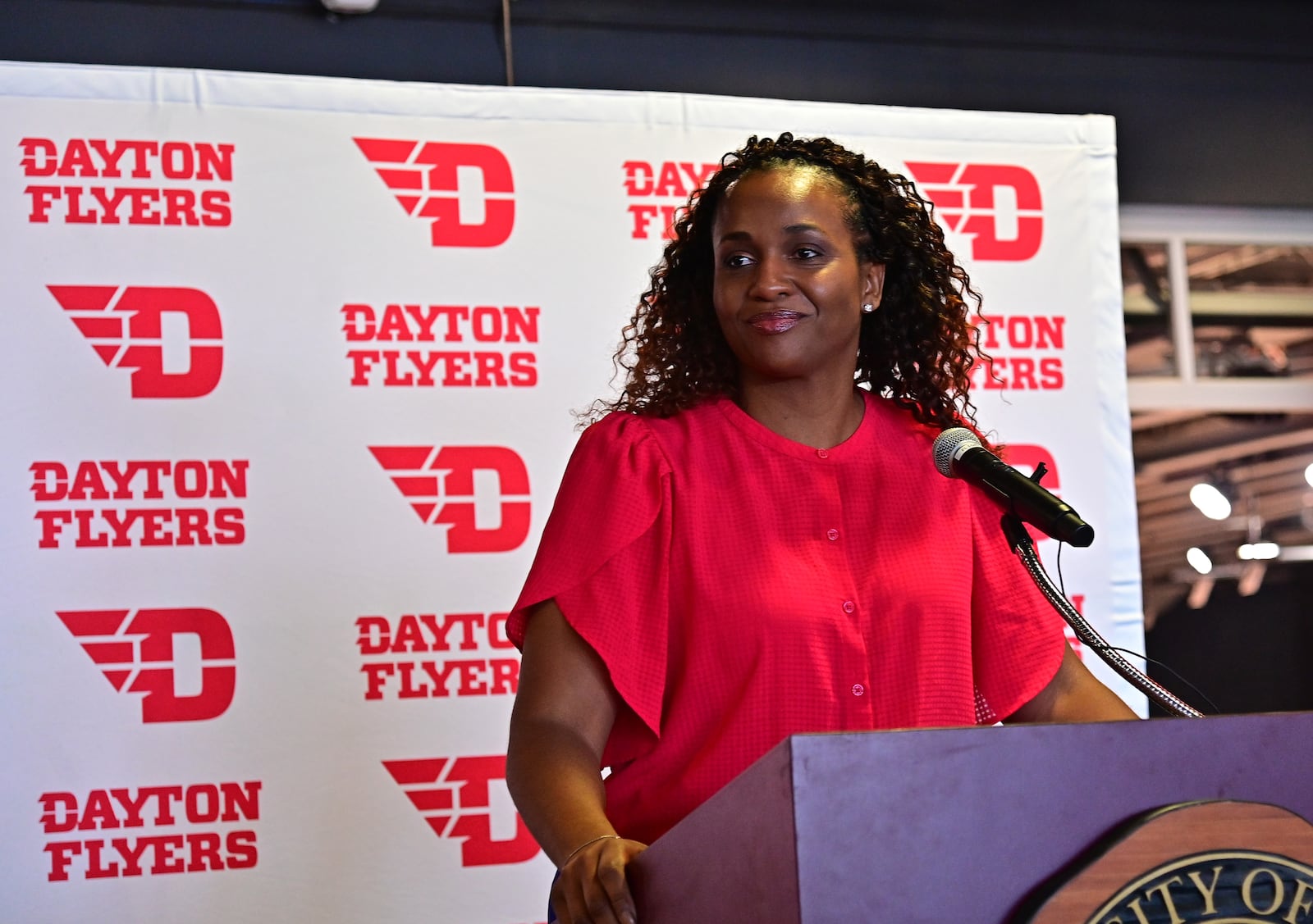 Tamika Williams-Jeter speaks at a press conference at UD Arena on Monday, March 28, 2022, as she's introduced as the new Dayton women's basketball coach. Photo by Erik Schelkun