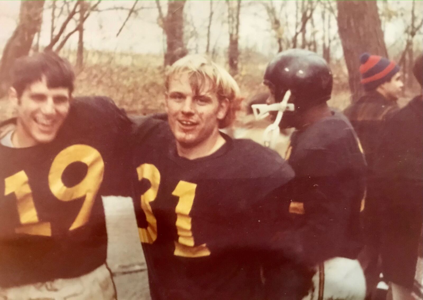 The Manchester College (Indiana) backfield in the late 1960s: quarterback Mike “Rookie” Kelly (No. 19) and fullback Jim ‘Bull” Andrews (No. 31). CONTRIBUTED