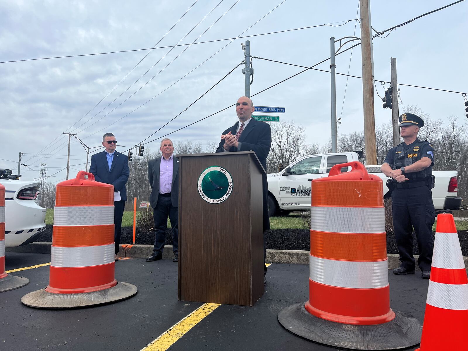 Dayton City Commissioner Matt Joseph speaks at a Tuesday press conference. Other speakers included ODOT District 7 officials Randy Chevalley and Matt Parrill and Dayton police Sgt. Gordon Cairns. CORNELIUS FROLIK / STAFF