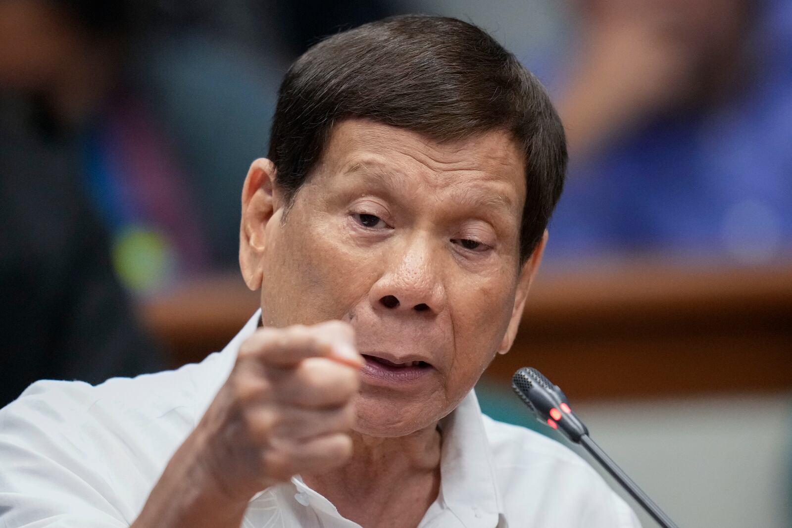 FILE- Former Philippine President Rodrigo Duterte speaks during a senate inquiry on the so-called war on drugs during his administration at the Philippine Senate Monday, Oct. 28, 2024, in Manila, Philippines. (AP Photo/Aaron Favila, File)