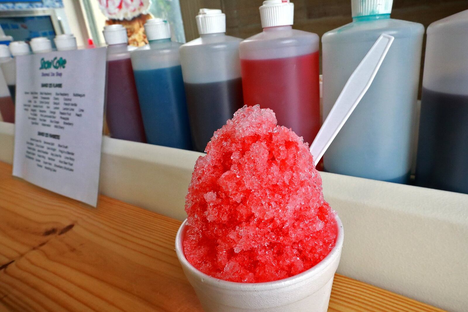 A cup of tropical shaved ice at Snow Cove Shaved Ice Shop. BILL LACKEY/STAFF