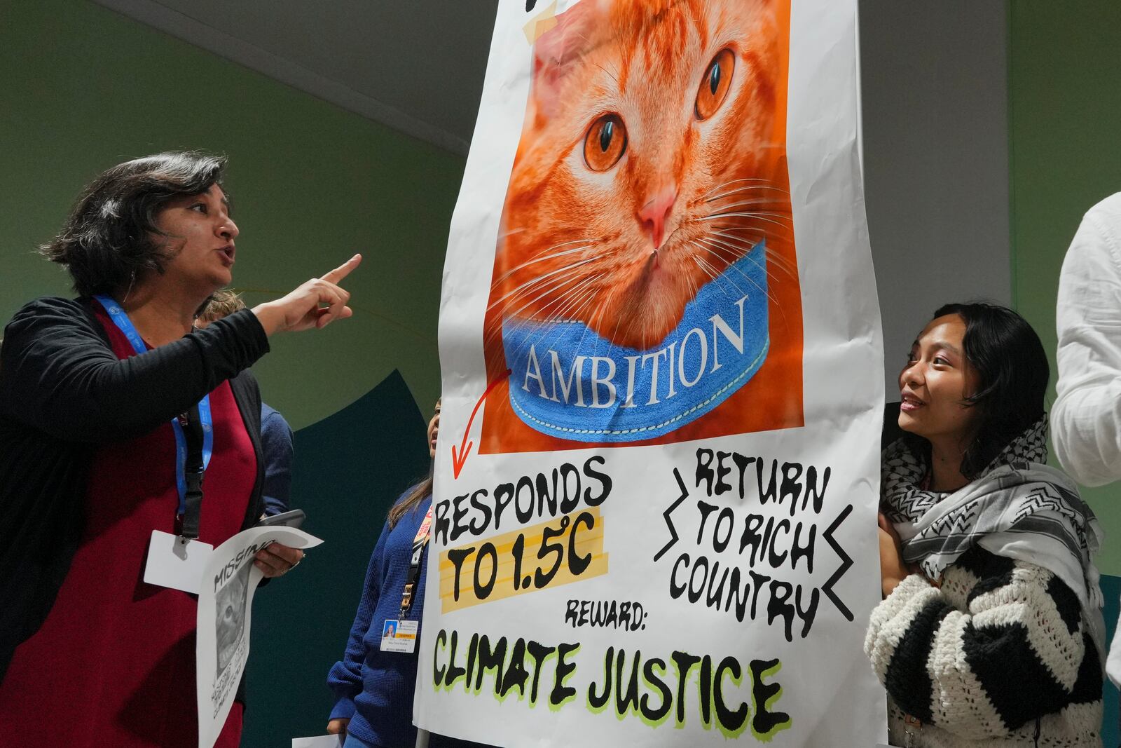 Activists participate in a demonstration for climate justice at the COP29 U.N. Climate Summit, Friday, Nov. 22, 2024, in Baku, Azerbaijan. (AP Photo/Peter Dejong)