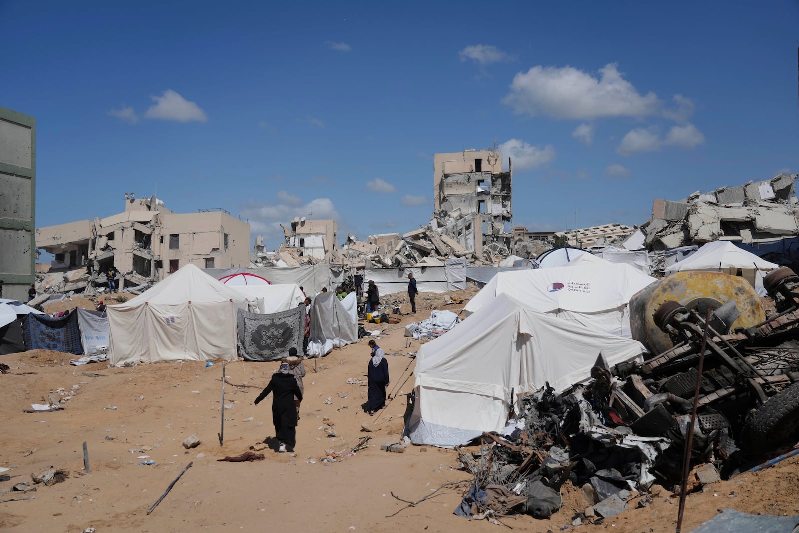 Displaced Palestinians set up tents next to the Indonesian Hospital in northern Gaza, a day after Israel's renewed offensive, Wednesday, March 19, 2025. (AP Photo/Jehad Alshrafi)