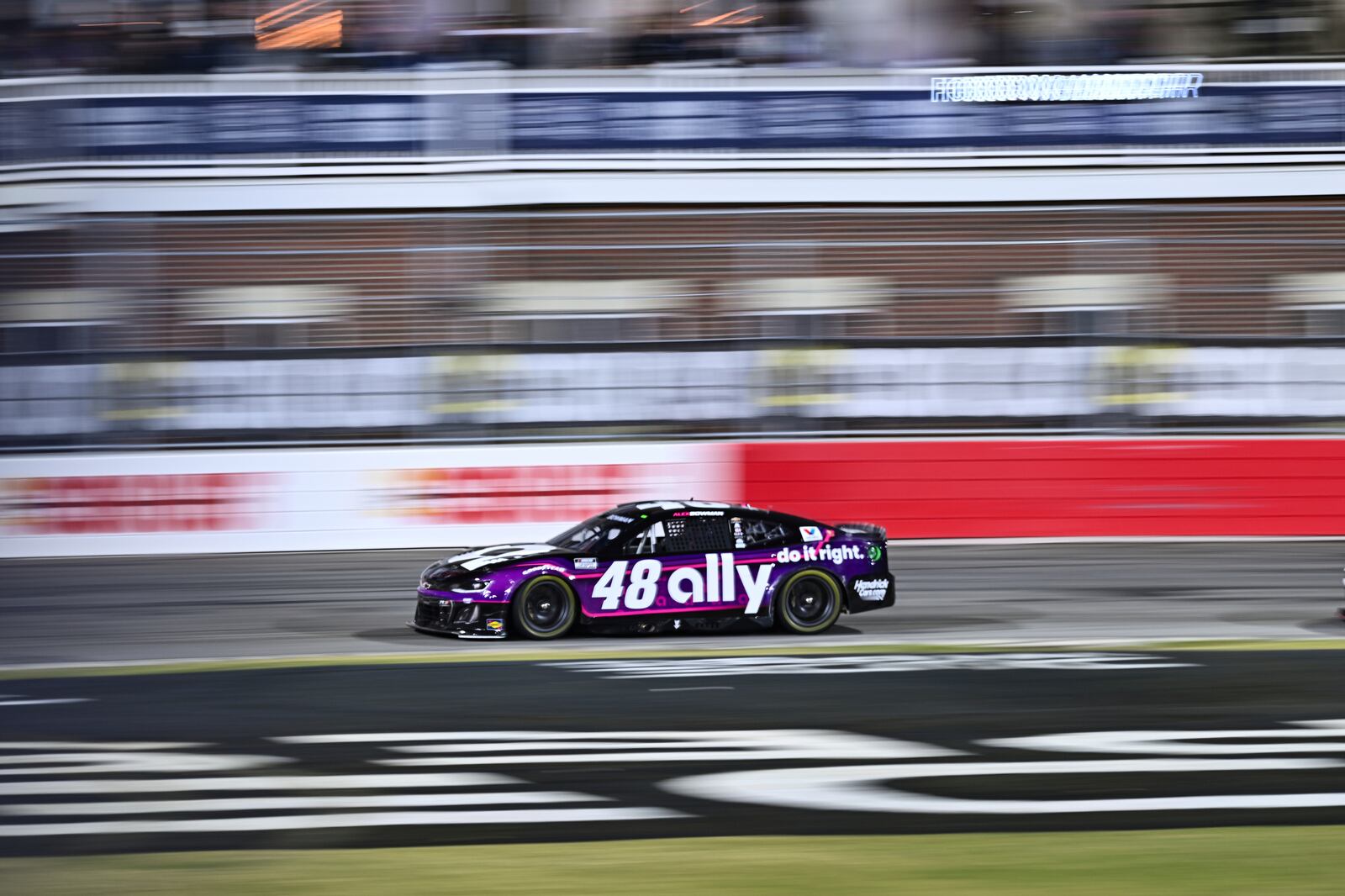 Alex Bowman steers into Turn 4 during a NASCAR Cup Series auto race at Bowman Gray Stadium, Sunday, Feb. 2, 2025, in Winston-Salem, N.C. (AP Photo/Matt Kelley)