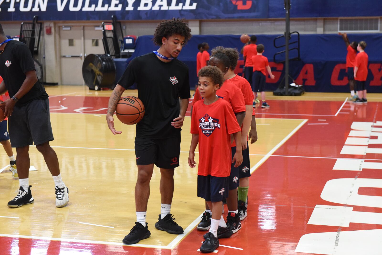 University of Dayton point guard Javon Bennett mentoring kids at Connor Kids Academy self-enrichment camp at the Frericks Center on the University of Dayton campus this past week. CONTRIBUTED