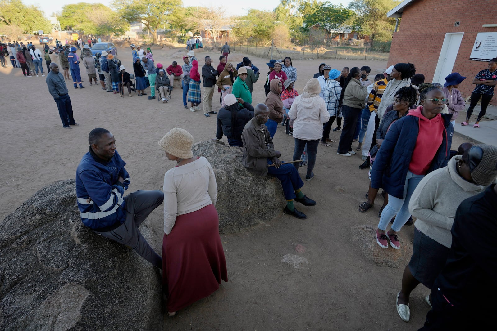 Residents wait for their turns to cast their votes during an election to decide if it keeps faith with one of the Africa's longest-ruling parties, in Gaborone, Botswana, Wednesday, Oct. 30, 2024. (AP Photo/Themba Hadebe)