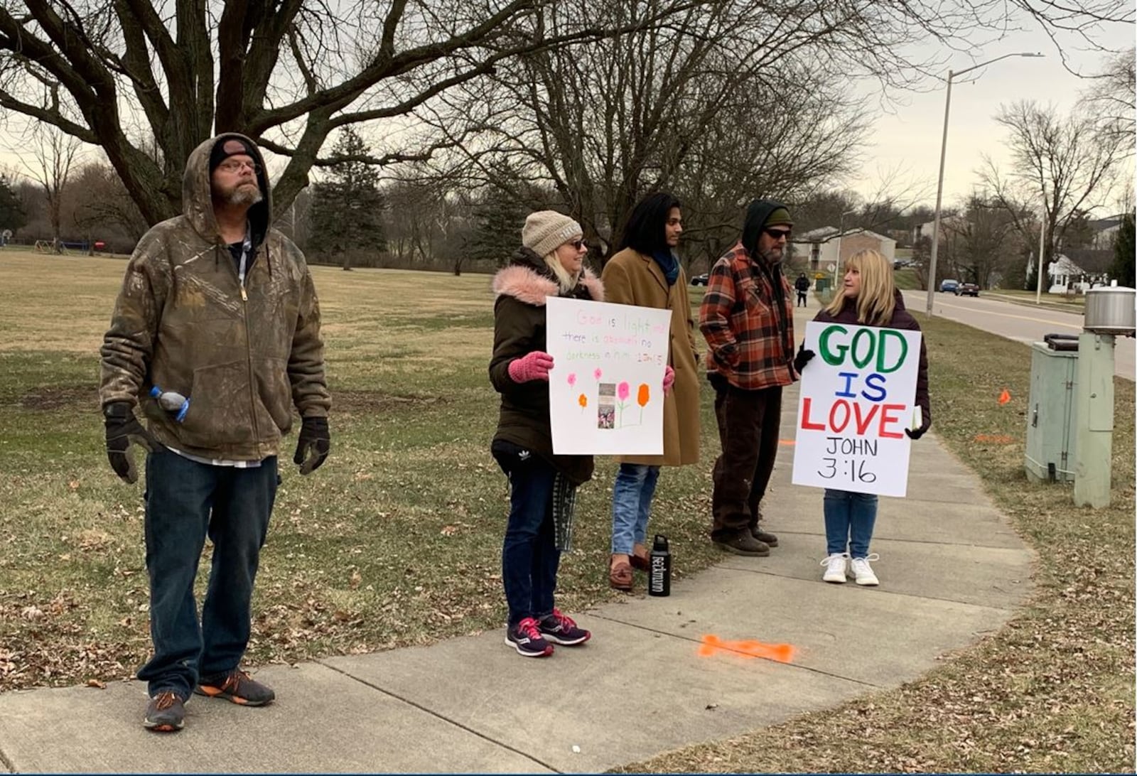 A group of Lebanon and Warren County residents expressed their opposition to the use of Donovan Elementary School for an After School Satan Club meeting on Thursday. No incidents were reported at the meeting or outside of the school. ED RICHTER/STAFF