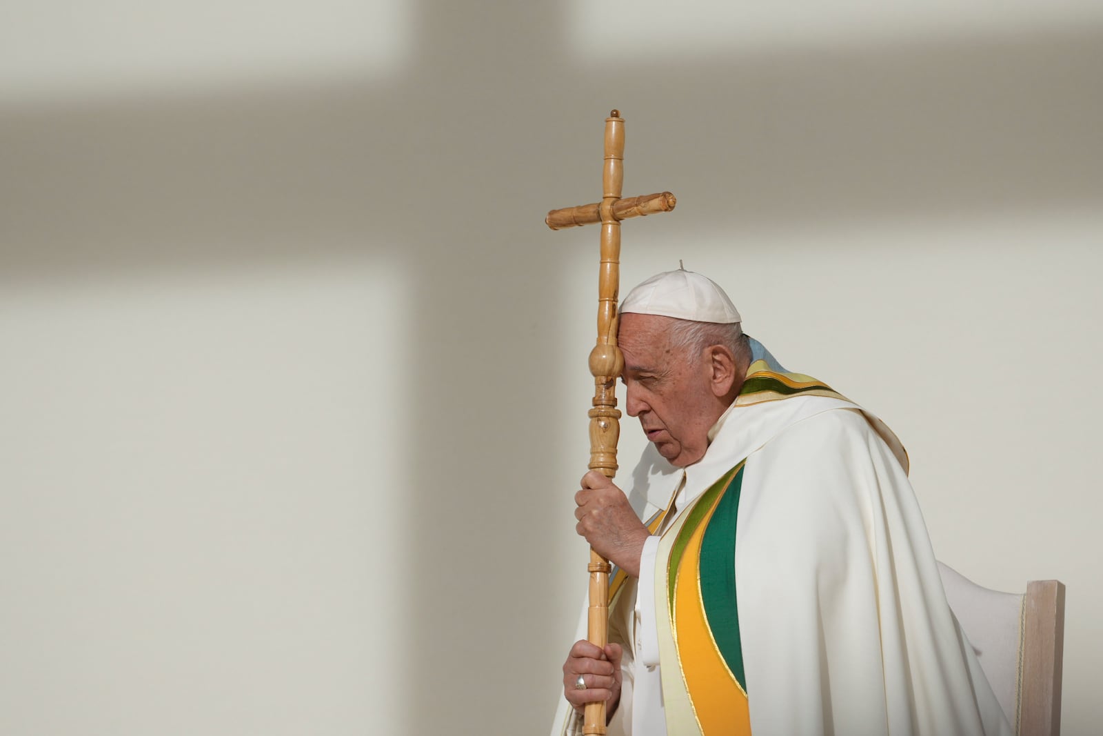 FILE - Pope Francis holds the pastoral staff as he presides over the Sunday mass at King Baudouin Stadium, in Brussels Sunday, Sept. 29, 2024. (AP Photo/Andrew Medichini)