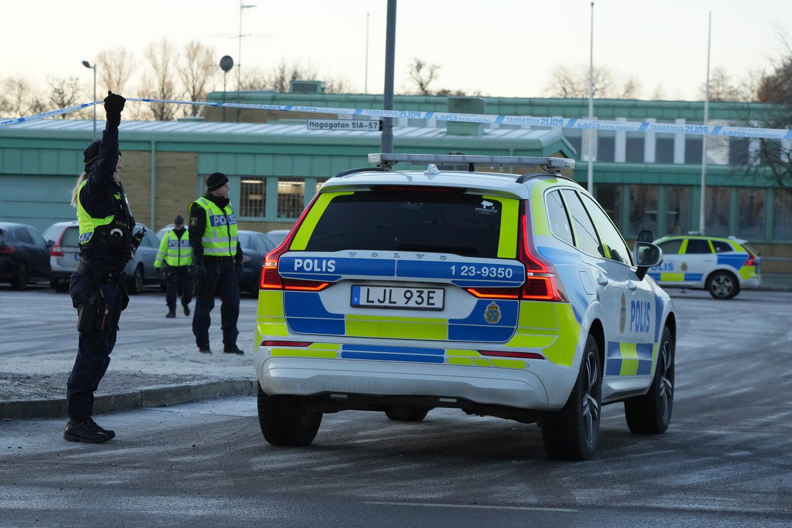 Police guard near the scene of a shooting at an adult education center on the outskirts of Orebro, Sweden, Thursday, Feb. 6, 2025. (AP Photo/Sergei Grits)