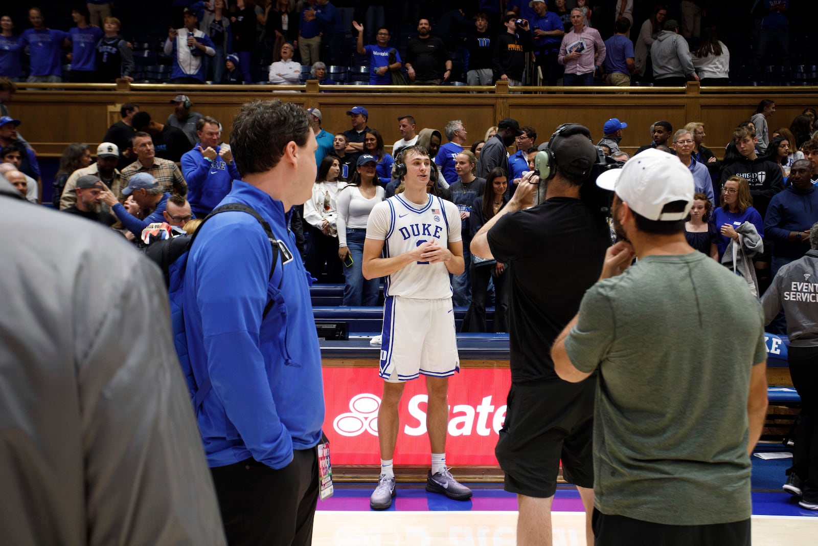 Duke's Cooper Flagg (2) gives an interview following an NCAA college basketball game against Maine in Durham, N.C., Monday, Nov. 4, 2024. (AP Photo/Ben McKeown)