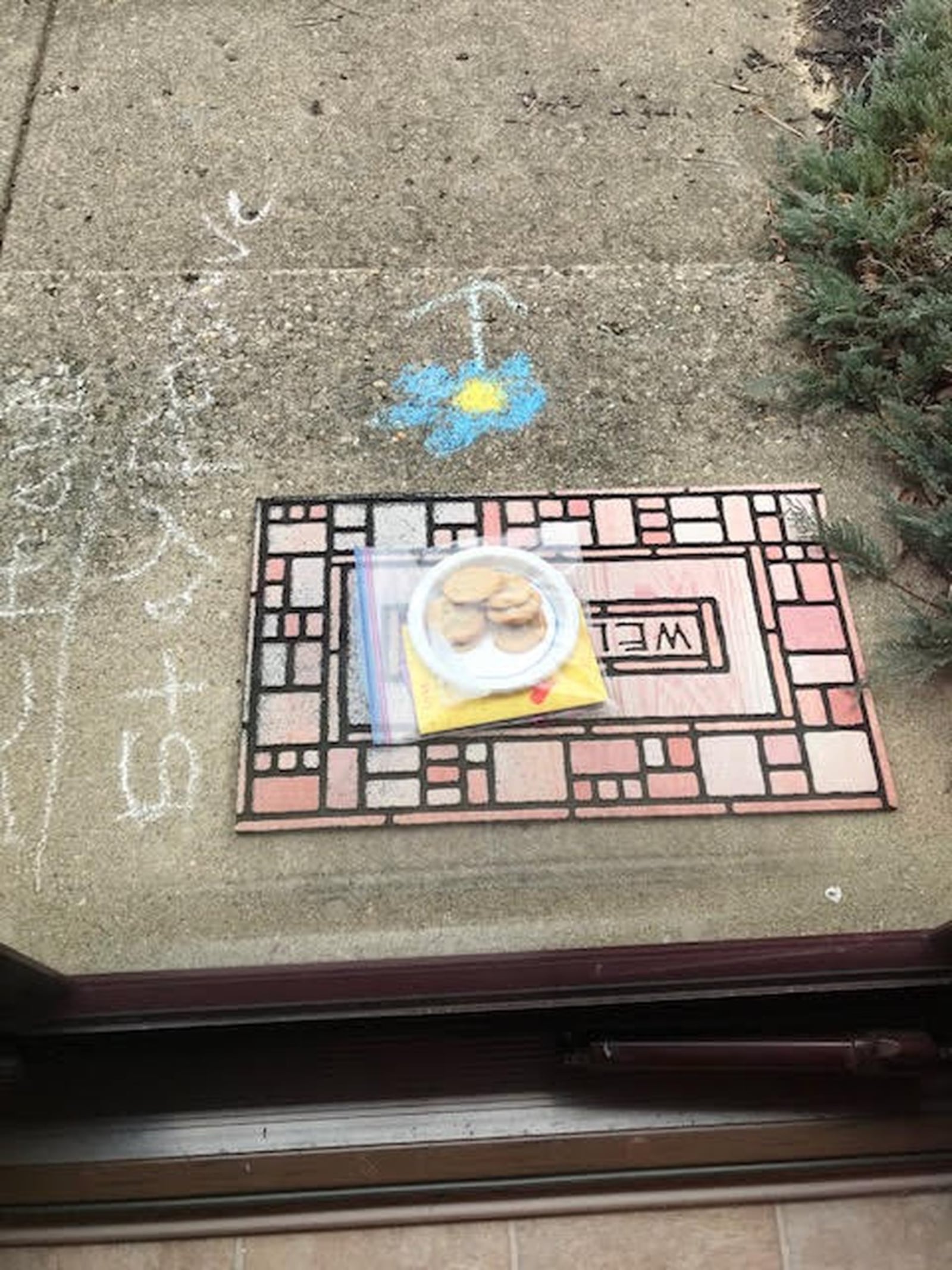 Joy Becker’s grandkids left chalk messages, cookies and cards for their relatives. The kids are Maddie, Wyatt and Carolyn Becker. CONTRIBUTED