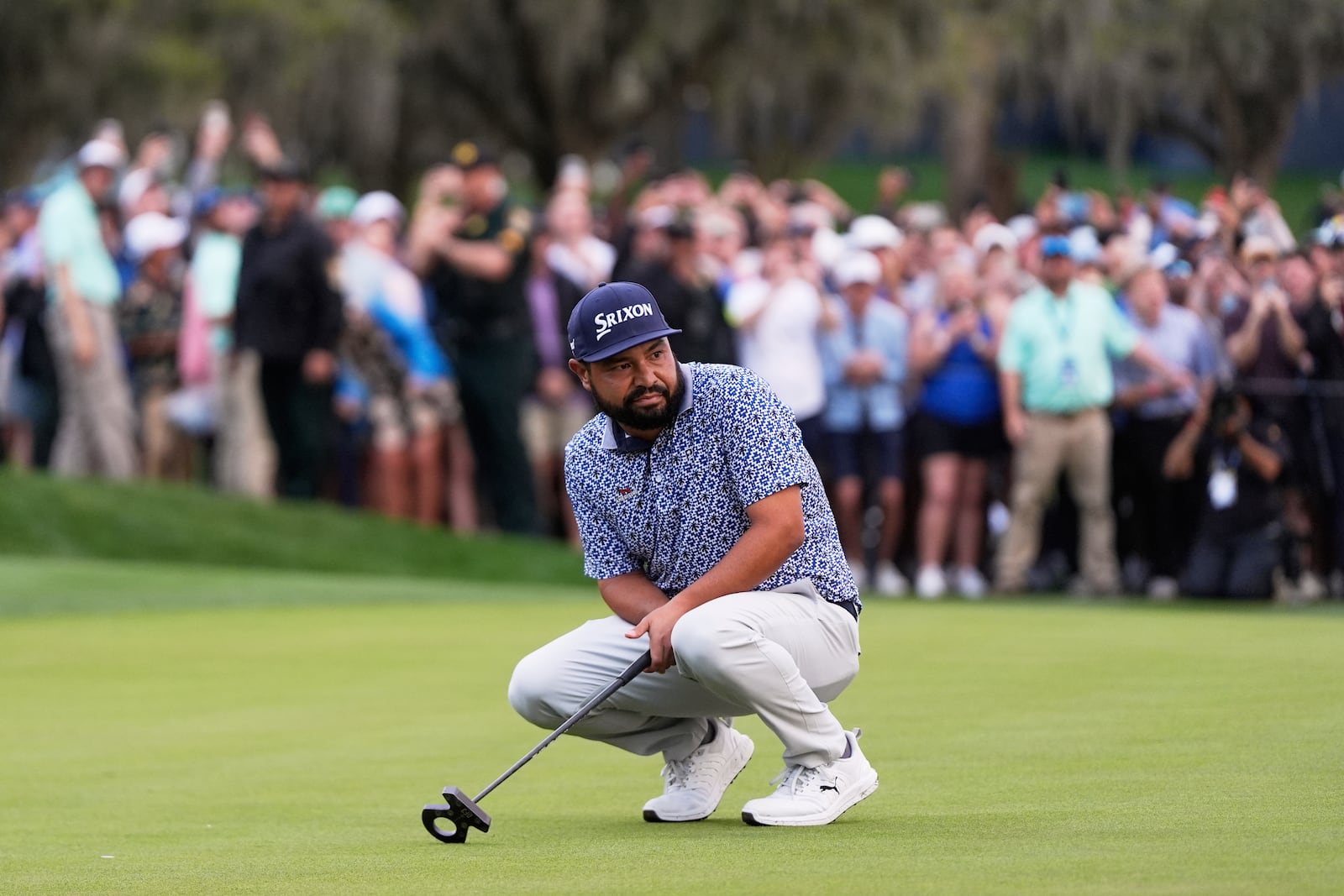 J.J. Spaun reacts after a putt on the 18th green during the final round of The Players Championship golf tournament Sunday, March 16, 2025, in Ponte Vedra Beach, Fla. (AP Photo/Julia Demaree Nikhinson)