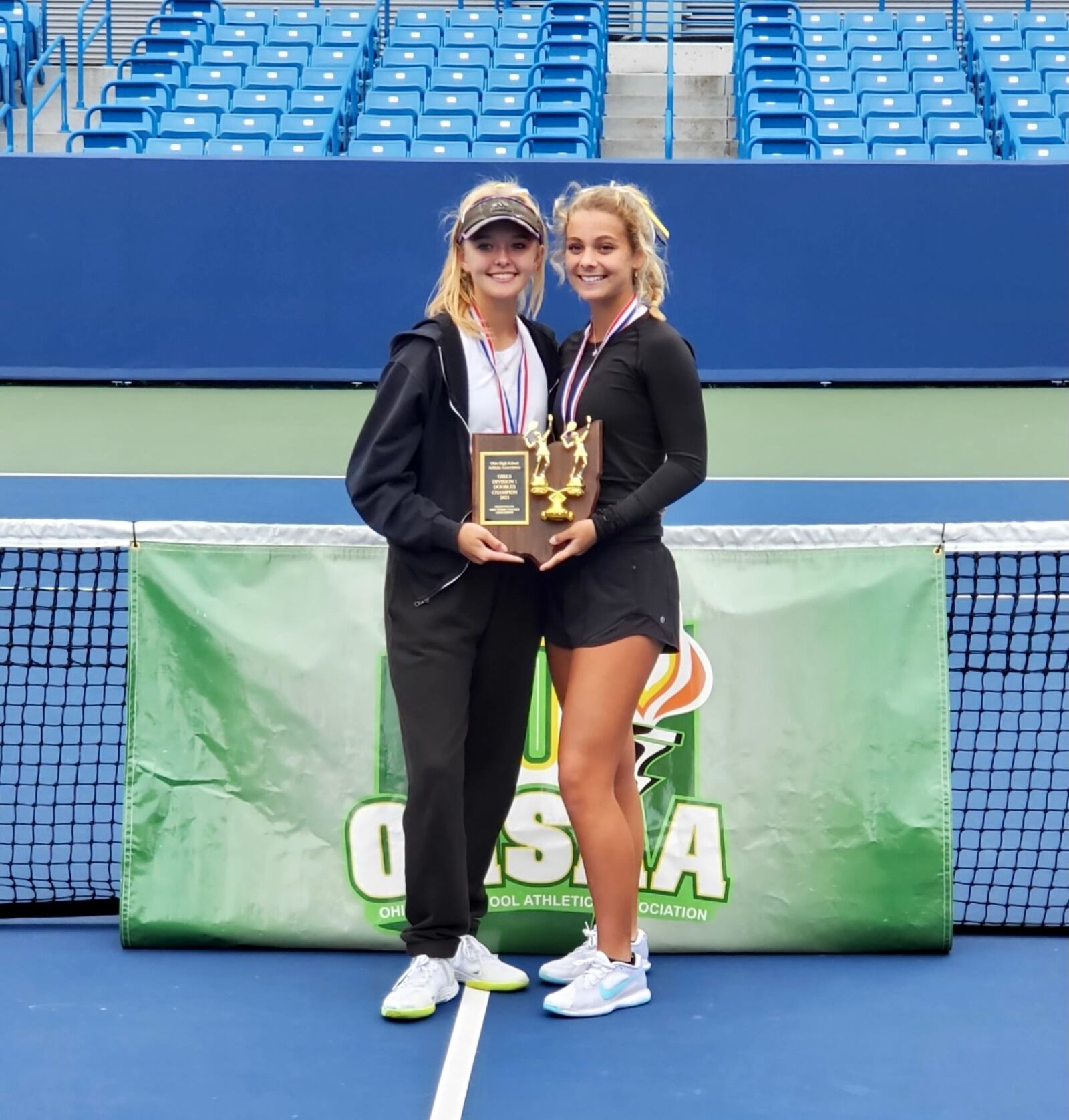 Centerville's Clara Owen (left) and Caroline Hinshaw won the Division I state doubles championship Saturday at the Lindner Family Tennis Center in Mason. CONTRIBUTED PHOTO