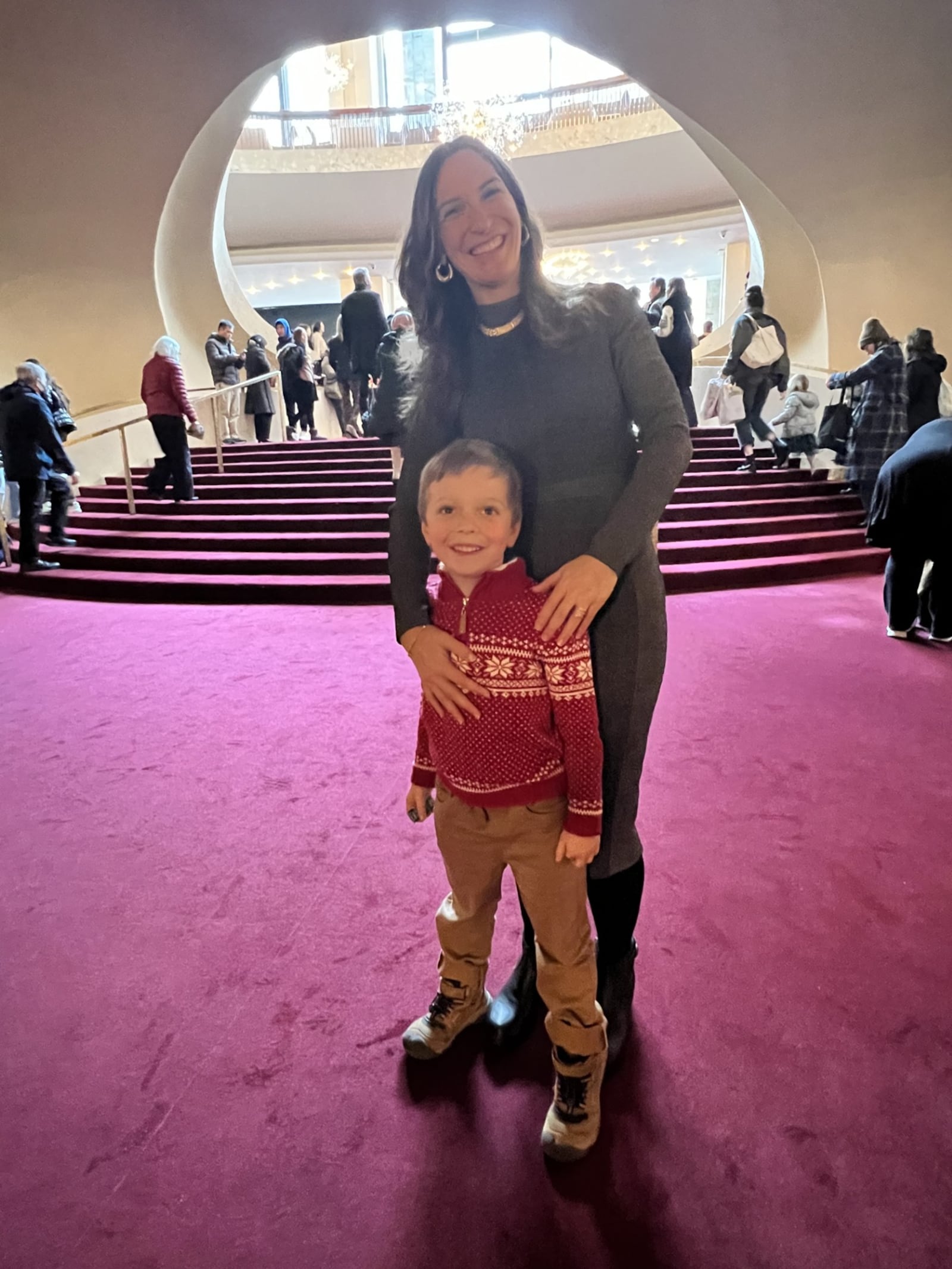 Jennifer Sydor, artistic director of the Dayton Dance Initiative, also dances with the Met Opera in New York.  Here, she is pictured with her son, Luca,  in the Met lobby following a performance of  “The Magic Flute.”  PHOTO CREDIT: DANIEL FABRICATORE