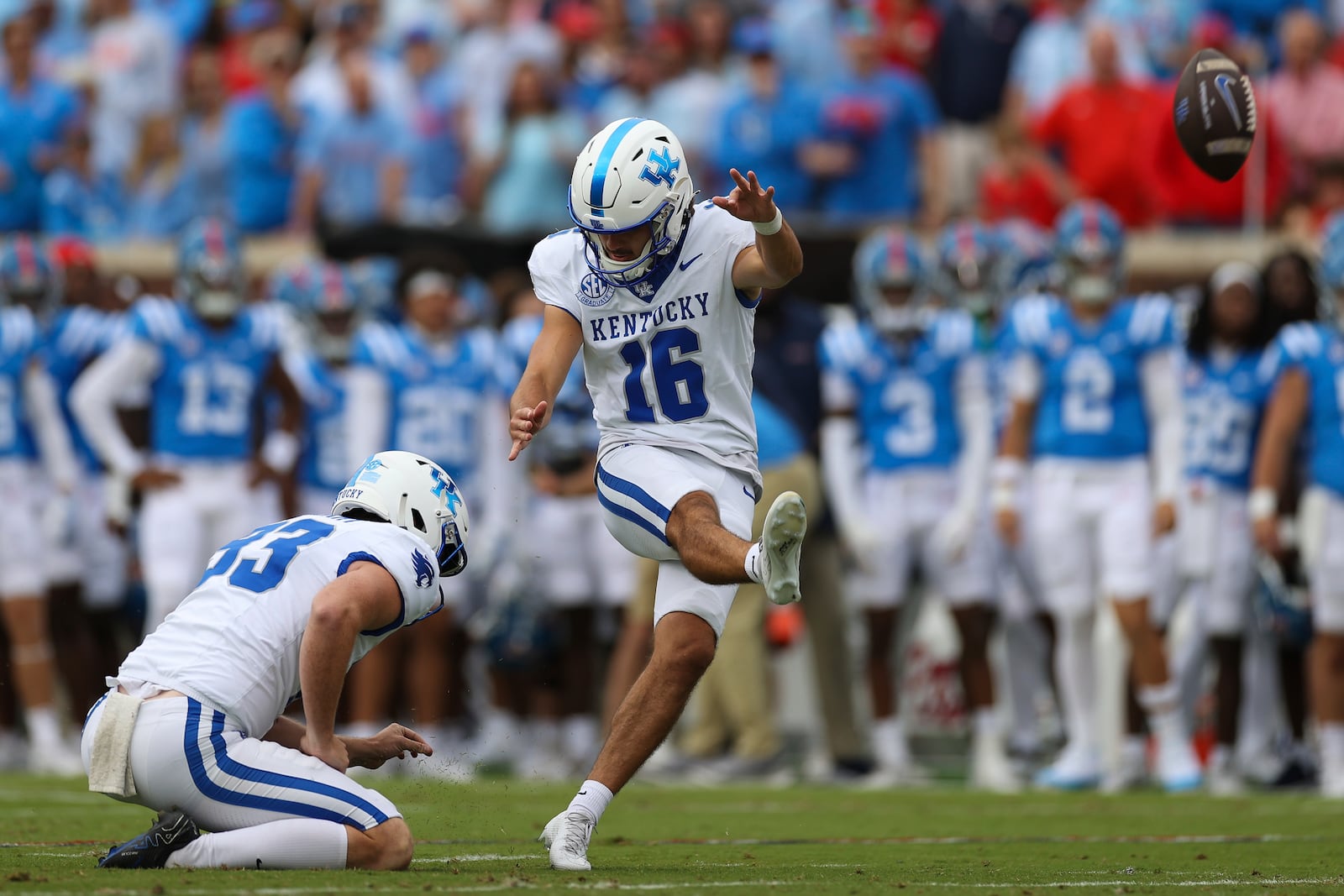 Kentucky's Alex Raynor (16) kicks a field goal during the first half of an NCAA college football game against Mississippi Saturday, Sept. 28, 2024, in Oxford, Miss. (AP Photo/Randy J. Williams)